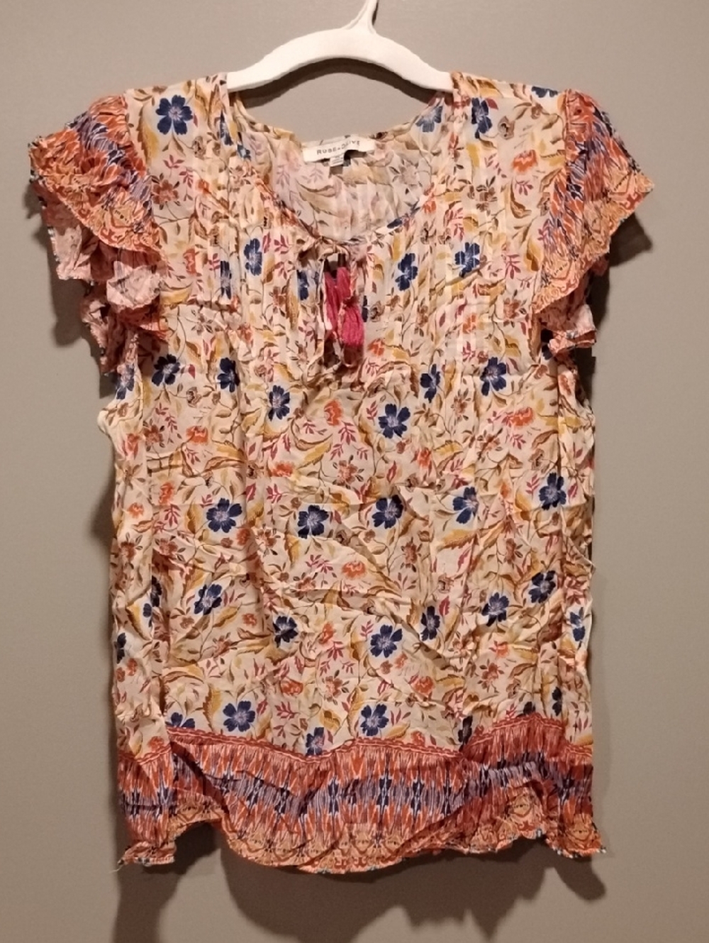 Rose & Olive Cream Floral Ruffle-Sleeve Blouse with Blue Accents